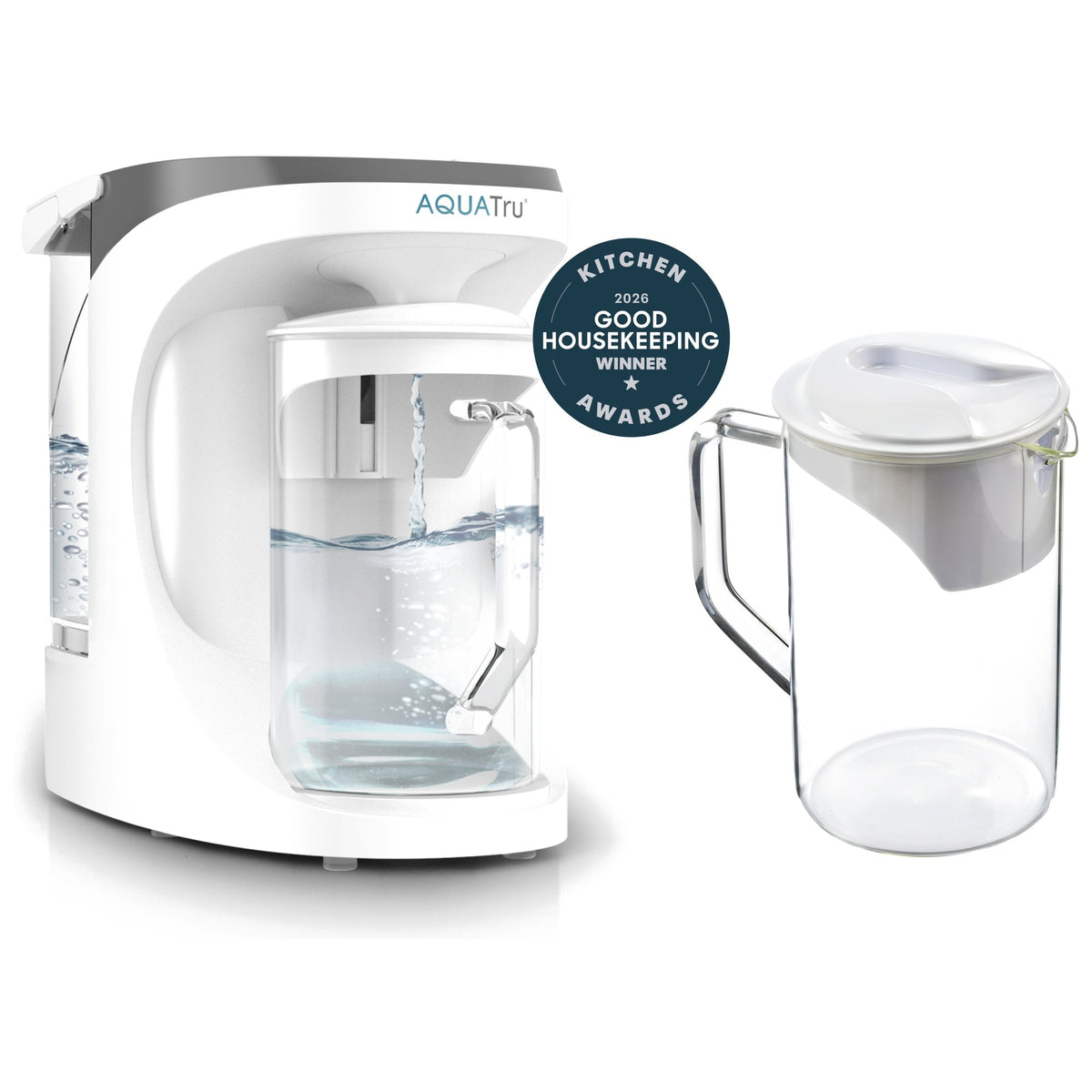 AquaTru water filtration system with a clear extra pitcher and a Good Housekeeping award seal.