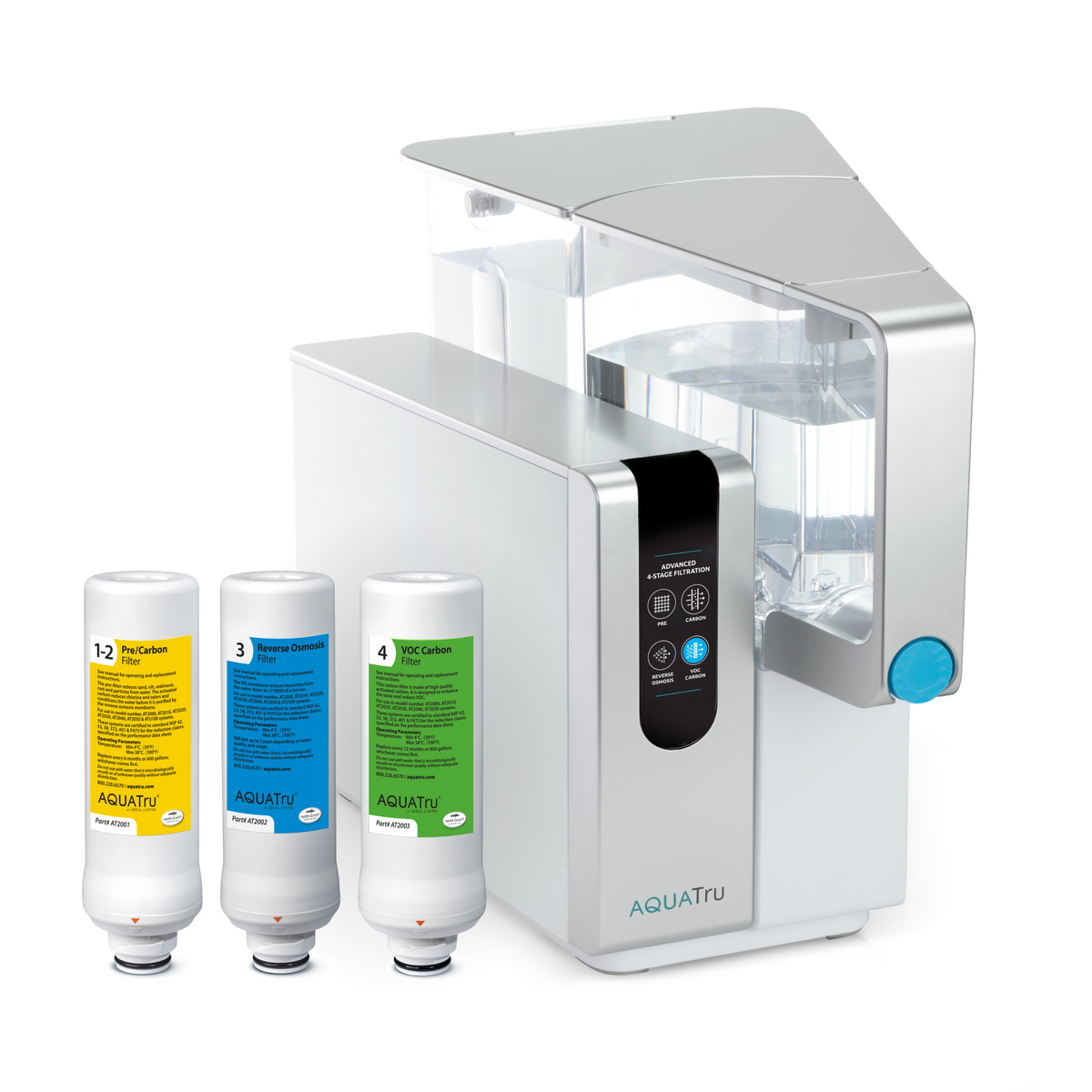 AQUATru countertop water filtration system with three replacement filters displayed beside it.