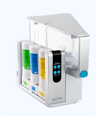 AQUATru water filtration system with three colored filters and a digital control panel.
