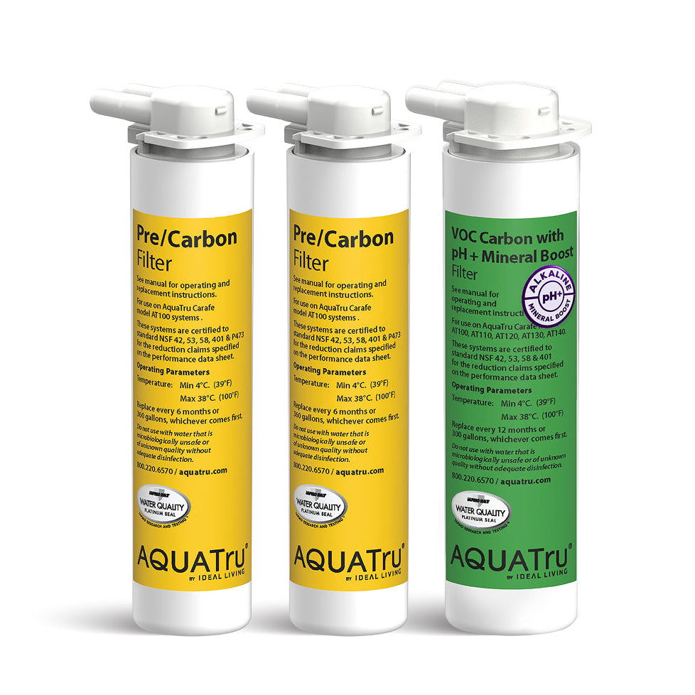 Three water filters in white and yellow packaging, labeled for pre/carbon and VOC carbon with pH+ mineral boost.