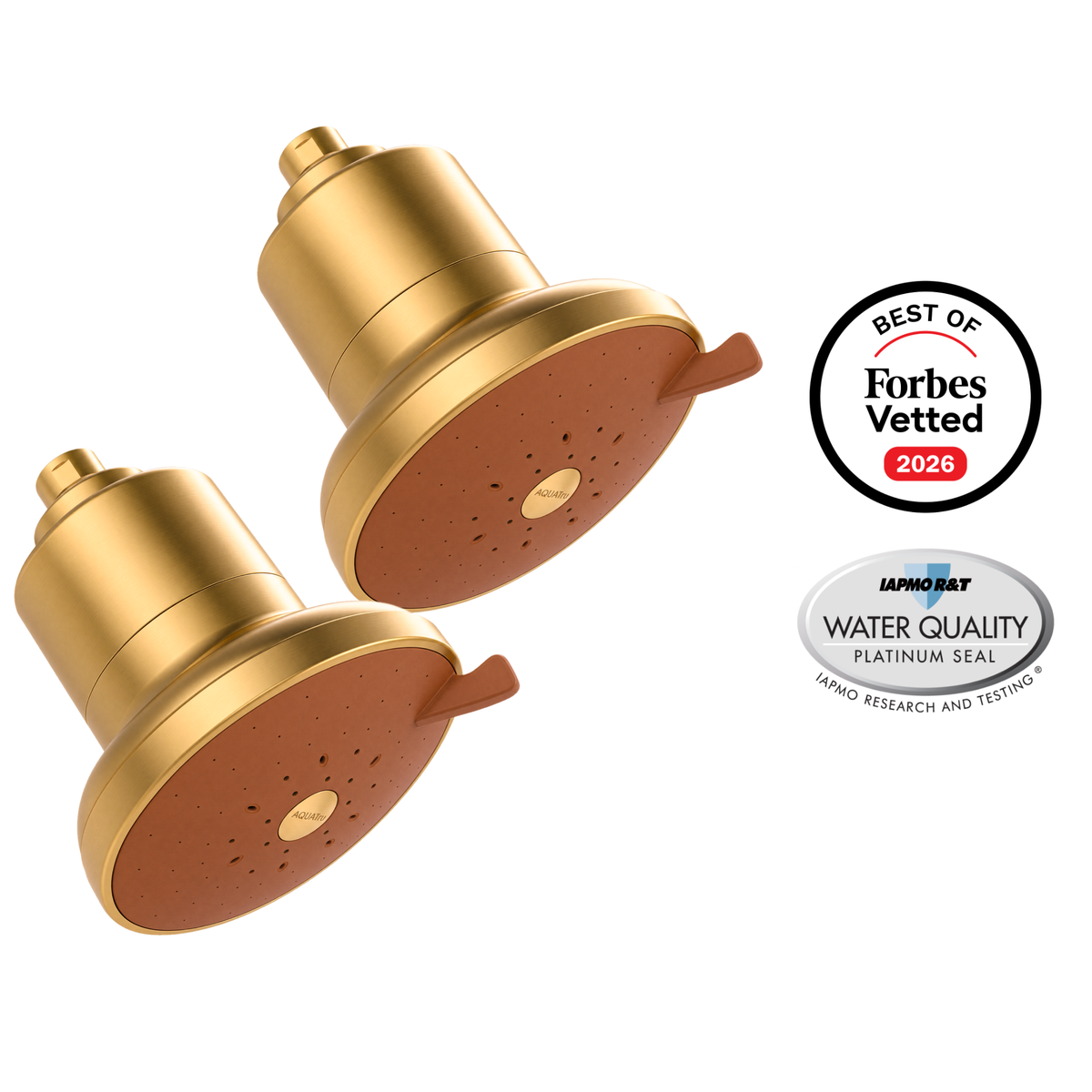 AquaTru Shower 2-Pack in brushed gold: two showerheads with terracotta spray faces, beside Forbes Vetted 2026 and IAPMO Platinum Seal badges