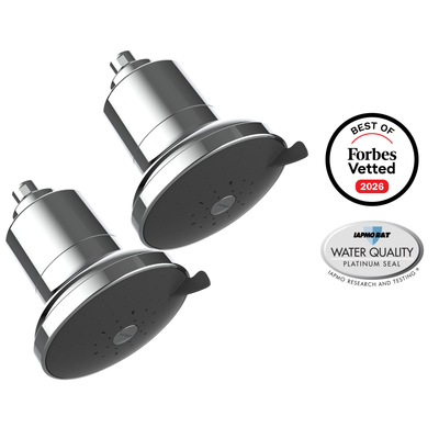 AquaTru Shower 2-Pack in chrome: two showerheads with polished chrome bodies and dark gray spray faces, beside Forbes Vetted 2026 and IAPMO Platinum Seal badges