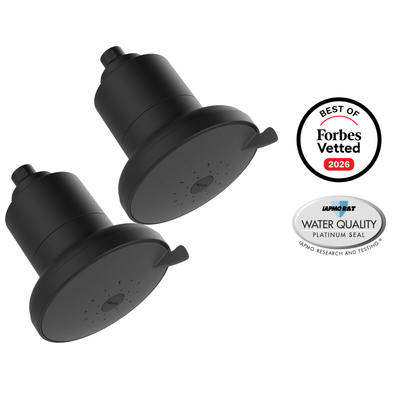 AquaTru Shower 2-Pack in matte black: two all-black showerheads, beside Forbes Vetted 2026 and IAPMO Platinum Seal badges