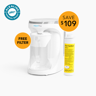 AquaTru Carafe with free pre-carbon filter, featuring alkaline mineral boost and sleek white design. Save $109!