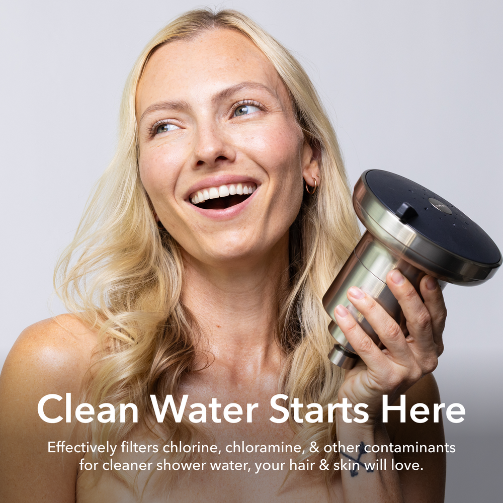 Woman holding a shower head with text about clean water filtering.