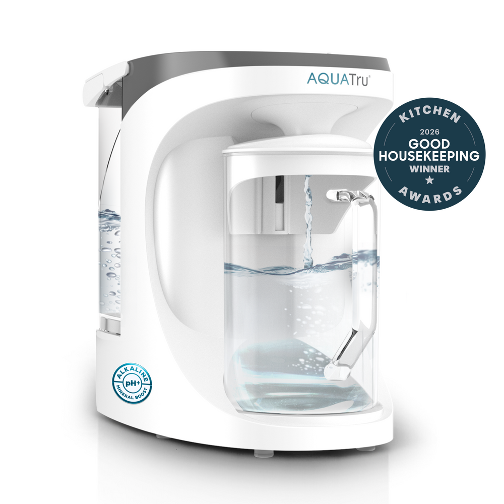 The AquaTru Carafe Alkaline Mineral Boost with a sticker that reads "Kitchen Awards 2026 Good Housekeeping".