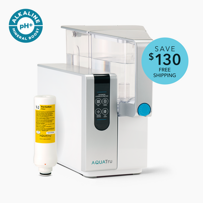 AquaTru Classic with Alkaline Mineral Boost with free Pre/Carbon filter, featuring a sleek white design and a savings tag of $130 as well as free shipping.