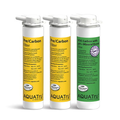 Three water filters in white and yellow packaging, labeled for pre/carbon and VOC carbon with pH+ mineral boost.