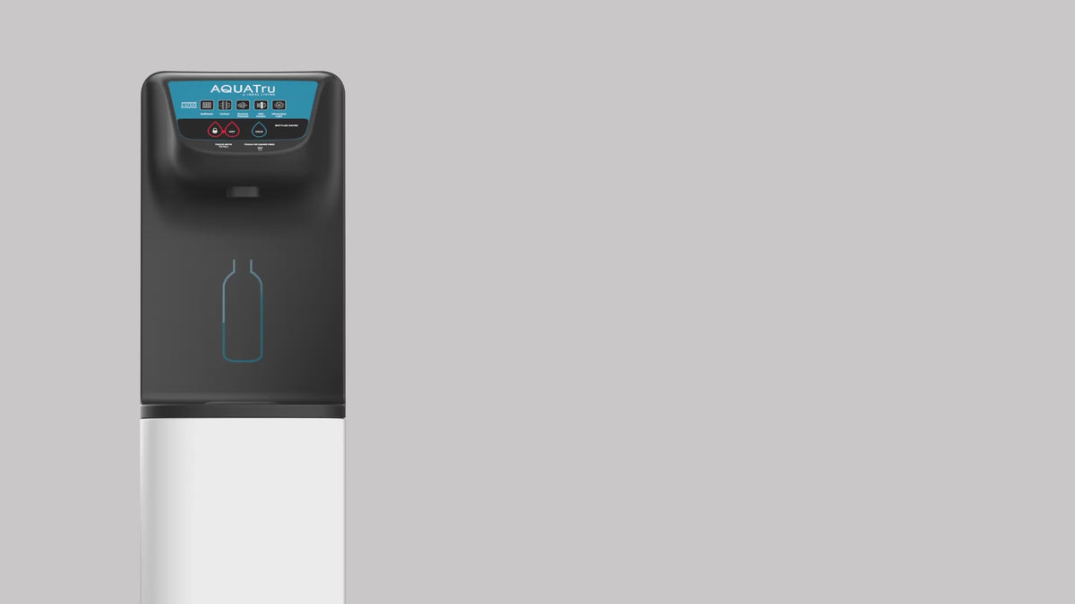 Load video: Video showing the process of changing the filters on the AquaTru Freestanding Model 1 water purifier. 