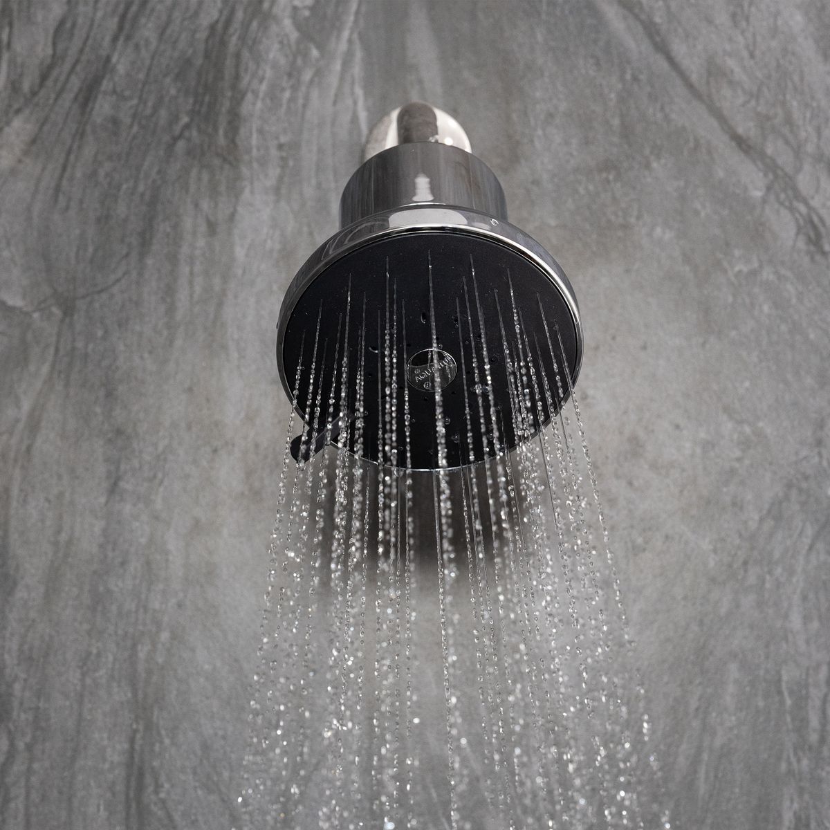 AquaTru Shower in Chrome, spraying water. 